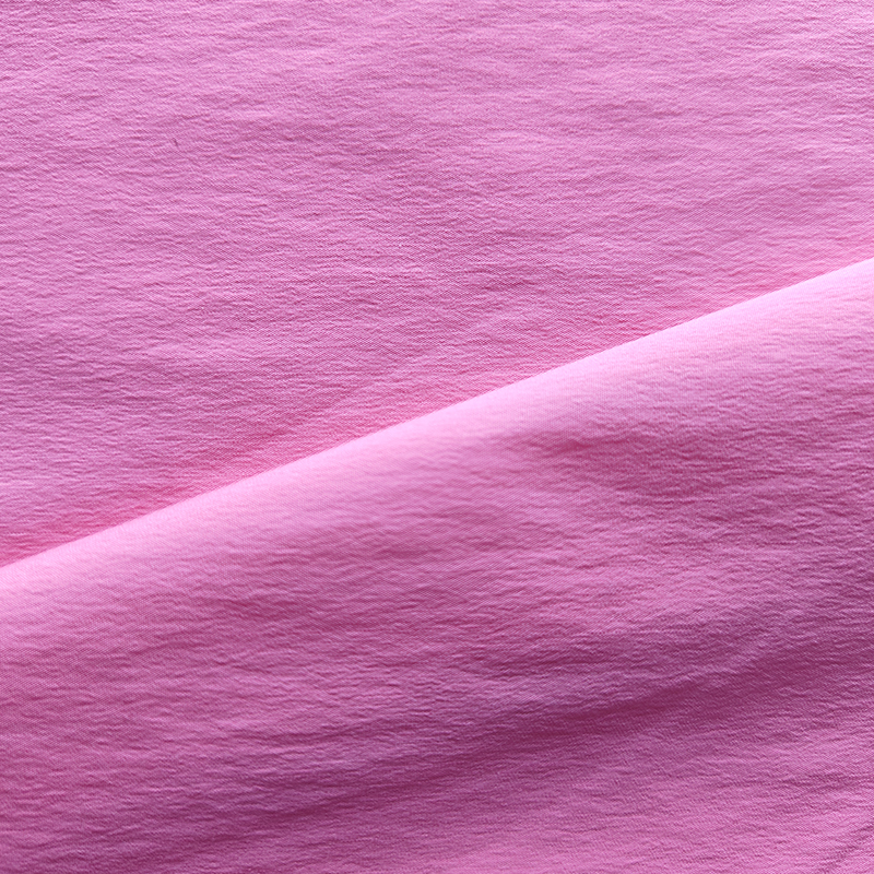 Ano ang Ginagawang Tunay na Gumagana ang Waterproof Breathable Sports Fabrics?